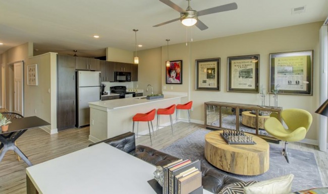 The essence of exceptional living a living room with a table and chairs